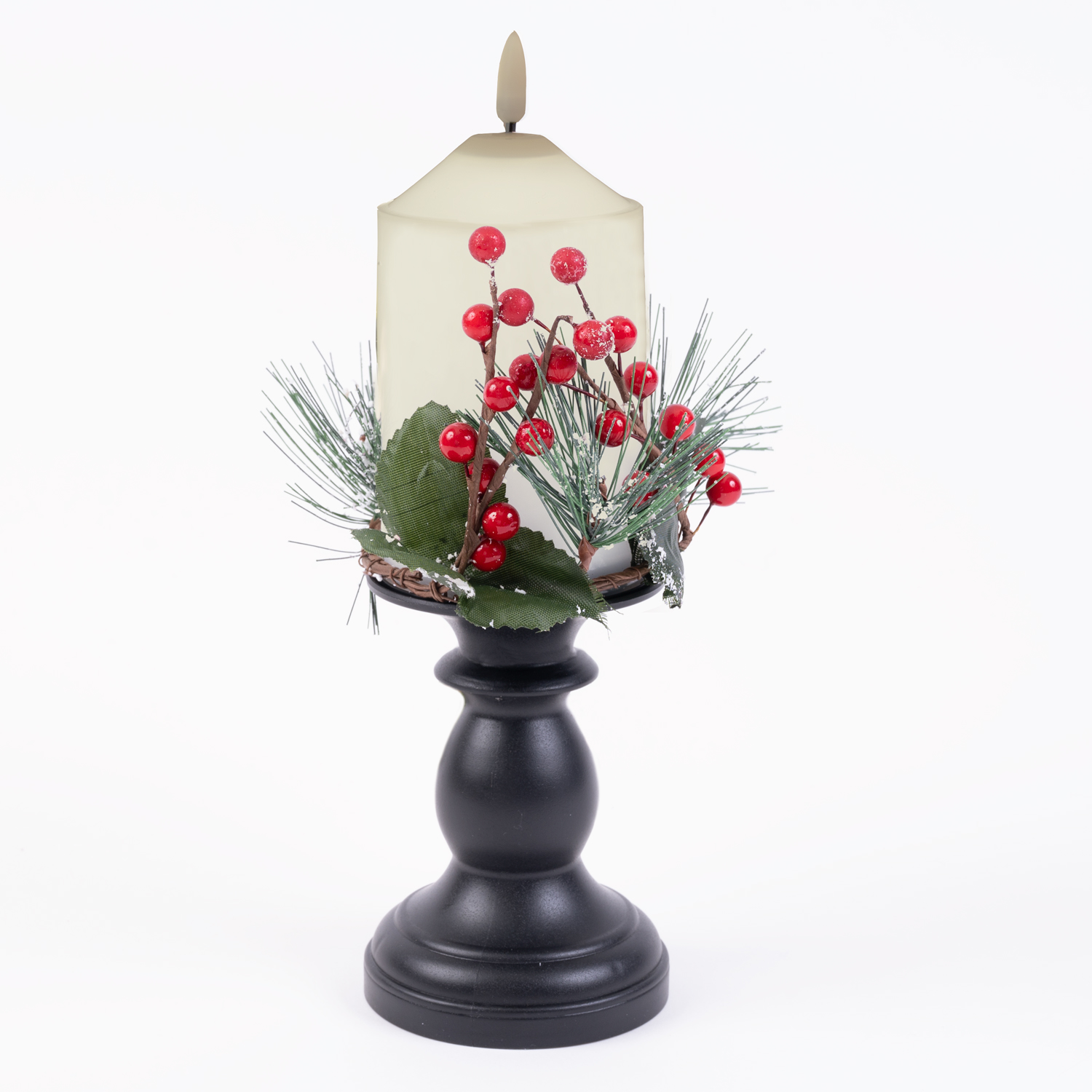 Decorative LED candle on pedestal with Christmas berries