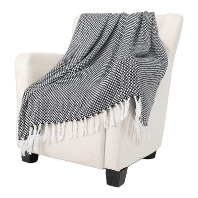 Reversible woven throw with boho tassels